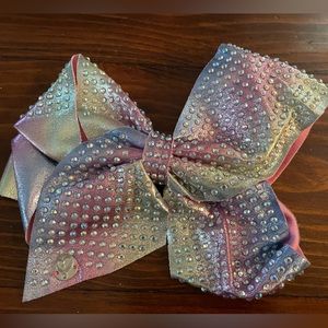 Jojo Siwa signature collection Radiant Rainbow Bow hair clip.
